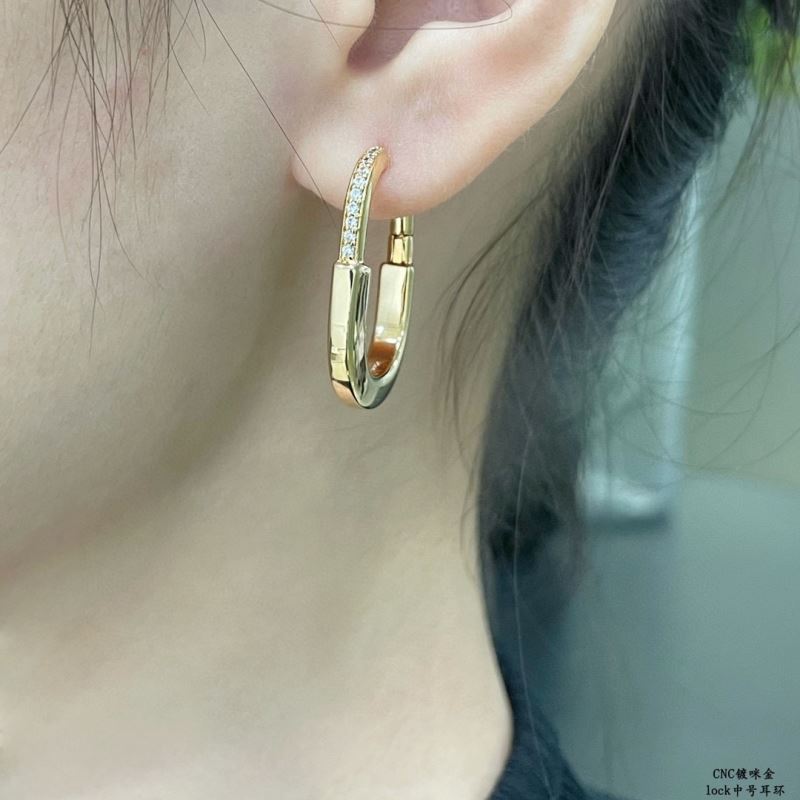 T*f*ny earrings